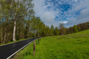 Morning on wet black road after rain near Nejdek town in north Bohemia