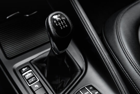 Manual gearbox handle in the car.