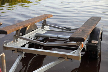 Empty boat trailer in the water after Boat launch