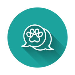 White line Paw print icon isolated with long shadow background. Dog or cat paw print. Animal track. Green circle button. Vector