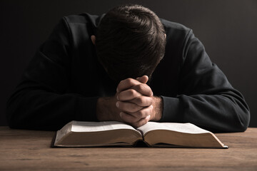 prayer man hand in Holy Bible