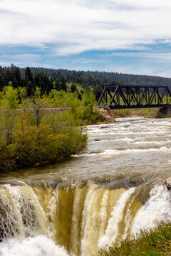 Thunder water over the falls in early spring. Lundbeck Falls PRA, Alberta, Canada