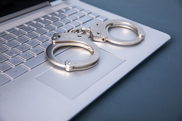 handcuffs on the computer