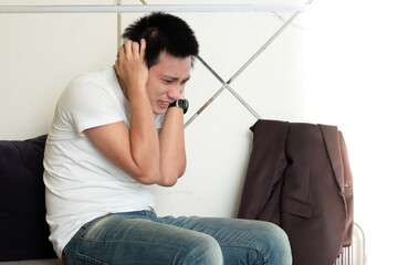 A mentally ill man in white clothes asian men