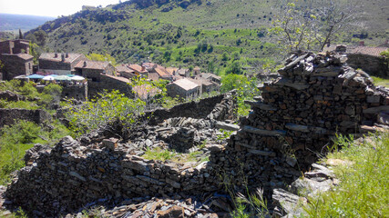 ancient ruins of houses made of stone in the town of Patones, Madrid