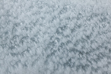 Fototapeta premium Frozen, uneven, icy texture, close-up. Rough ice.