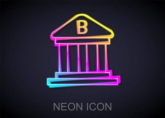 Glowing neon line Bank building icon isolated on black background. Vector