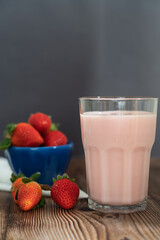 Red strawberries on the wooden table