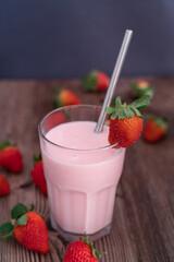 Red strawberries on the wooden table