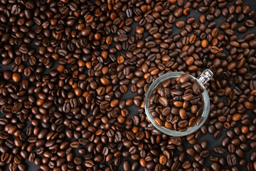 coffee beans close up. Top view. Texture of roasted brown coffee beans.Top view with copy space.