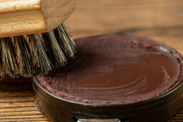 Shoe wax polish cream and cleaning brushes for leather boots care