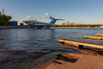 A picturesque view of the Khimki reservoir in Moscow. In the center is an old rocket plane