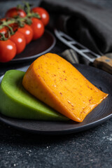 Block of hard cheese with chili and wasabi flavor.