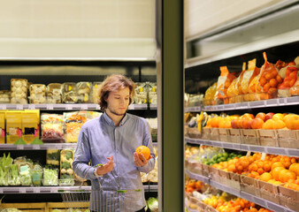 Man buying fruits and vegetables  at the market