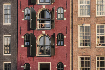 Architecture of typical old buildings of Amsterdam. The Netherlands.