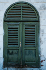 Old wooden green window
