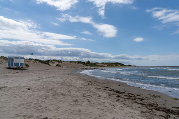 empty beach near Lilleleje in northern Denmark with a small lifeguard hut
