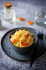 Cabbage carrot red pepper salad in a bowl
