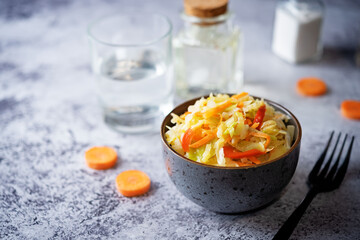 Cabbage carrot red pepper salad in a bowl