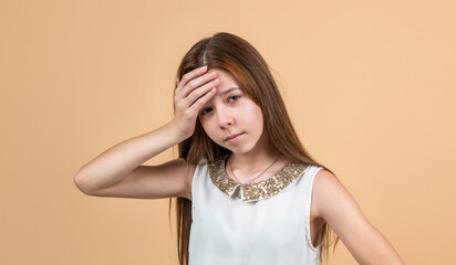 stressed girl kid touching forehead because of headache, migraine