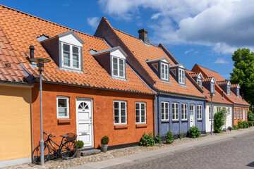 colorful houses and cobblestone street in the historic old town of Koge in Zealand