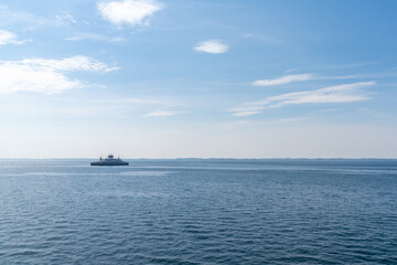 view of the Langeland Ferry crossing the open ocean from Langeland Island to Lolland Island in Denmark