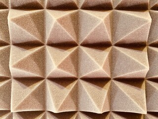 Soundproof acoustic foam for the recording studio and any room. The texture of the volumetric pyramids of the three-dimensional volume of triangles.