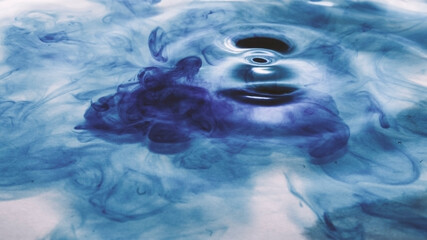 Fluids background made with blue ink