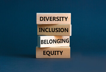 Equity, diversity, inclusion and belonging symbol. Wooden blocks with words 'equity, diversity,...