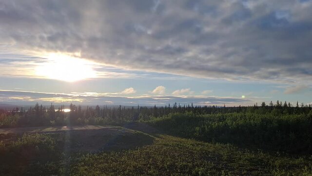 travel sweden and scandinavia - sunrise, sunset, sun, timelapse of the midnight sun at the lake Stora Lulevatten northern the Arctic Circle at Jokkmokk, Sweden, Lapland