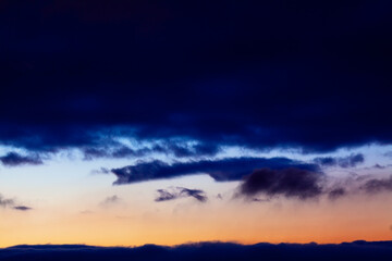 Fototapeta premium Dark blue clouds on the evening sky 