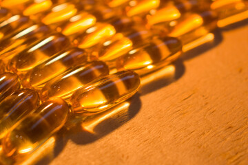 capsules on a wooden table