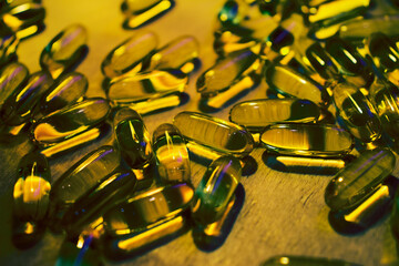 capsules on a wooden table