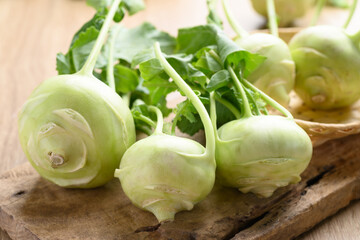 Fresh kohlrabi on wooden background, Organic vegetables