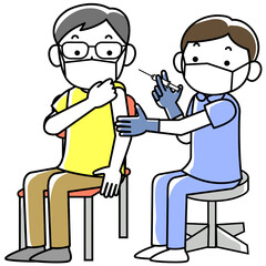 注射をする男性看護師