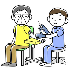 採血する男性看護師