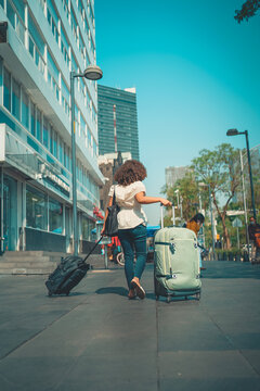 Black Woman Leaving  With Her Luggage