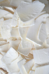 slices of cassava which ready to be dried up and fried to make chips