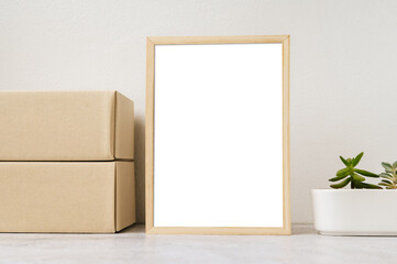 Picture frames and plant pots on a white background