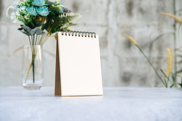 a books and vases on the white floor.