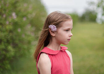 portrait of a little girl in a field