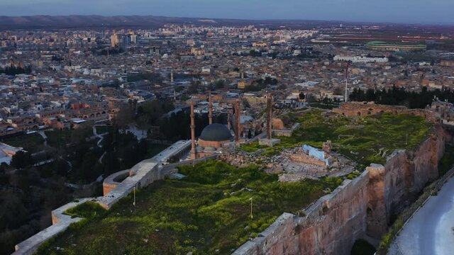 Aerial view of Urfa Castle.city view in the background.  the place where Nimrod threw the Prophet Abraham into a fire.. 4K.