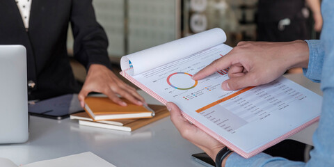 Close up Business people meeting to discuss the situation on the market. Business Financial Concept