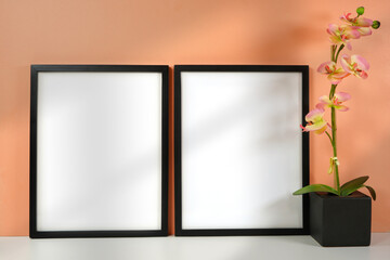 On trend shadow photography blank frame mockup featuring new season background color, coral. Negative copy space.