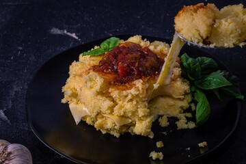 cornmeal polenta with cheese and sauce