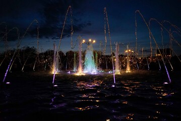 illuminated fountain at night