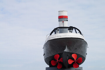 The propeller of the red color of the ship at the shipyard