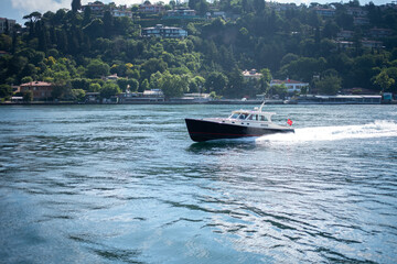 Fototapeta premium Istanbul Turkey - 07.15.2021: Ship in the Bosphorus