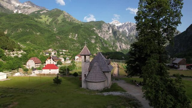 Church of Theth village on beautiful panoramic high alpine mountains in Albania
