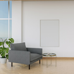 The living room consists of a sofa chair and a picture frame on the wall.